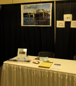 This is my table from last year. This year I'll have my second book, The Crossings Guide, also.