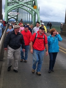 The parade had approximately 1,000 people cross the Yaquina Bay Bridge.